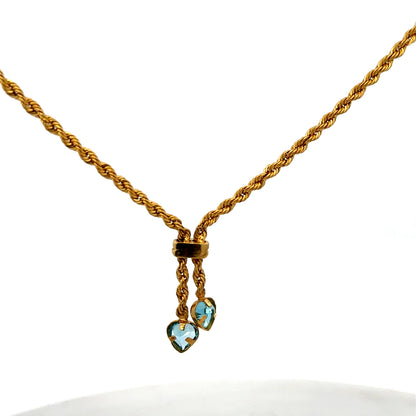 Reeves and Sons 9ct yellow gold chain weighing 3.8g, featuring a detailed link design, close-up view of the jewelry.