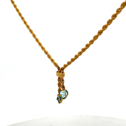 9ct yellow gold chain by Reeves and Sons, weighs 3.8g, with a detailed close-up showing the chain links and gold finish.