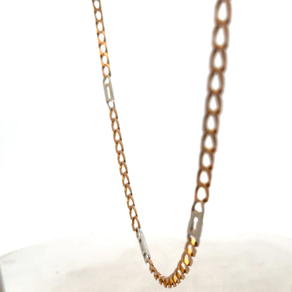 9ct yellow gold chain weighing 13.9g from Reeves and Sons, close-up view showing detailed links and shiny finish.
