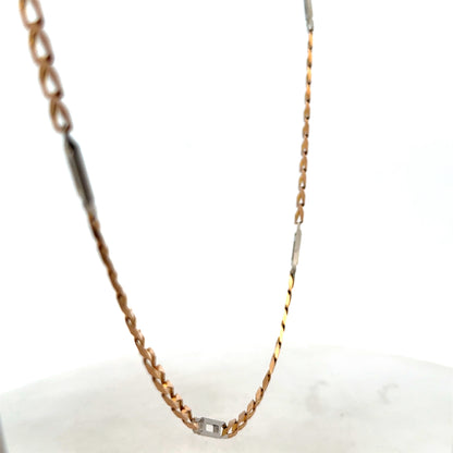 9ct yellow gold chain from Reeves and Sons, weighing 13.9g, displayed in a close-up image showing its classic link design.