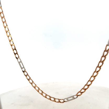 9ct yellow gold chain weighing 13.9g with Reeves and Sons branding, shown in close-up image highlighting its links and polished finish.