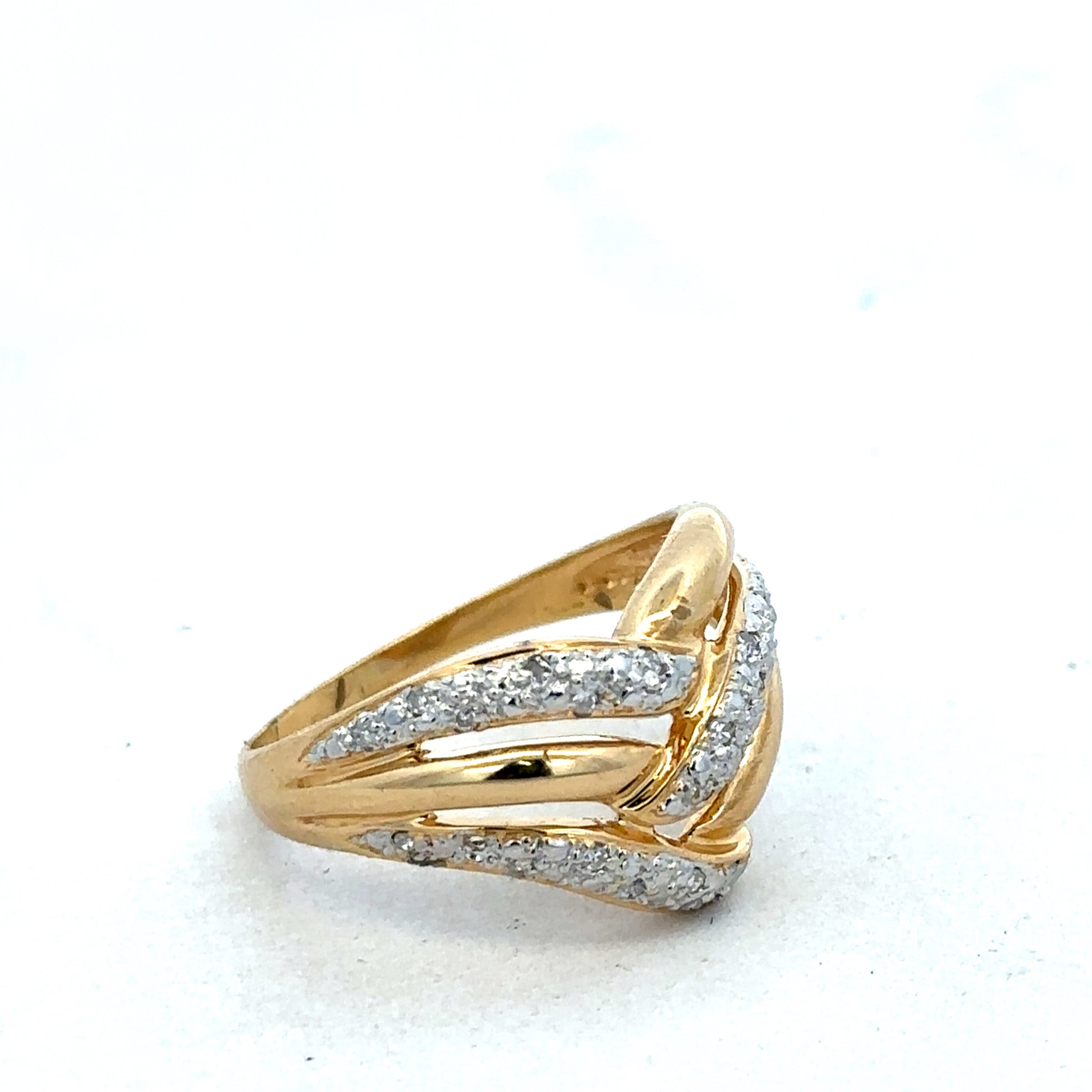 18ct yellow gold diamond ring by Reeves and Sons featuring sparkling diamonds and elegant design.