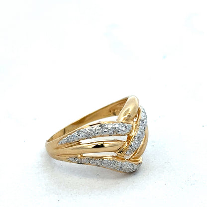 18ct yellow gold diamond ring by Reeves and Sons featuring sparkling diamonds and elegant design.