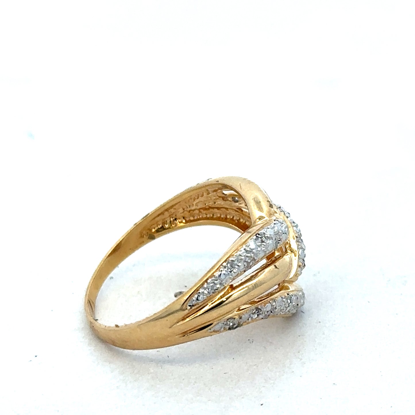 18ct yellow gold diamond ring by Reeves and Sons featuring sparkling diamonds and a classic design.