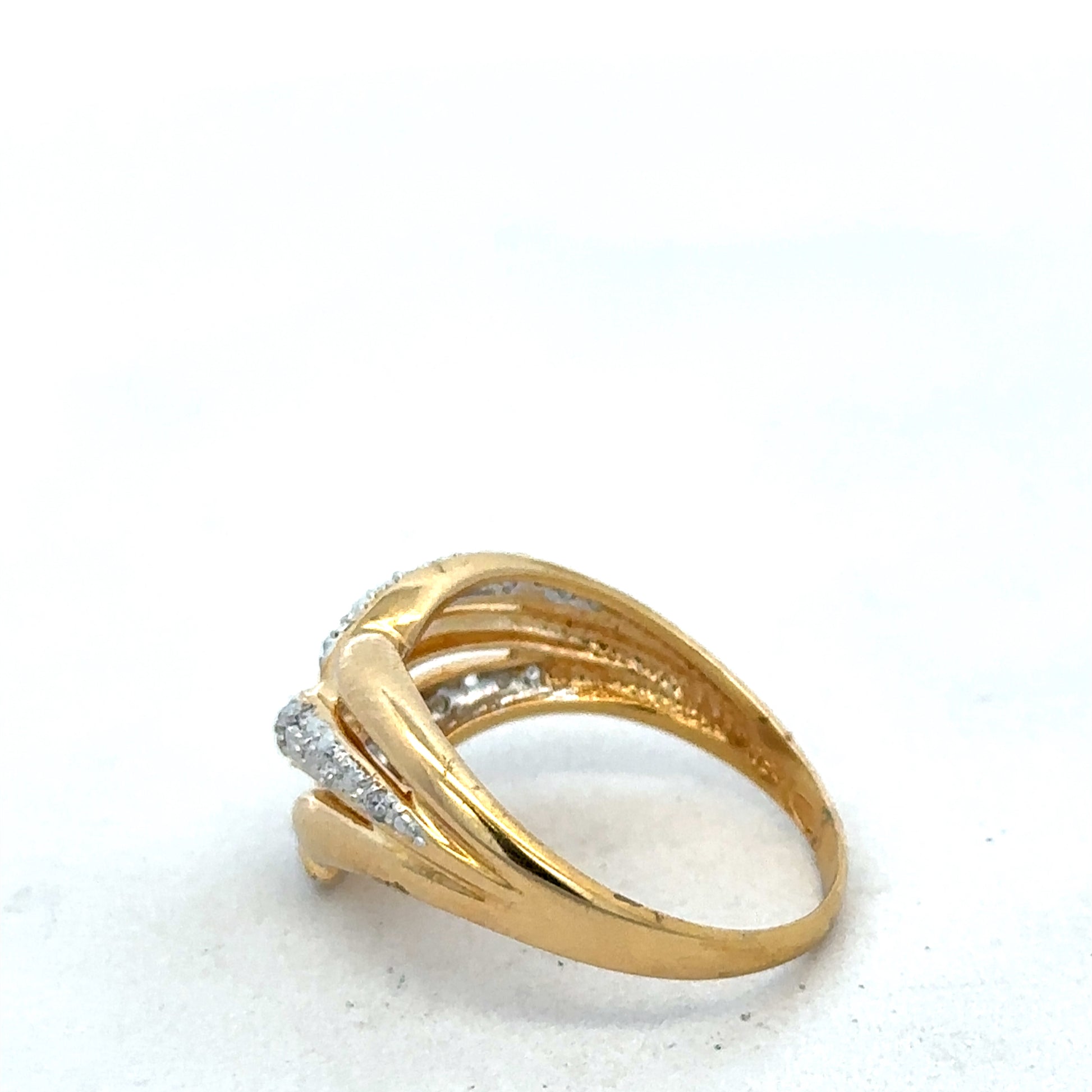 18ct yellow gold diamond ring by Reeves and Sons with sparkling diamonds and elegant design.