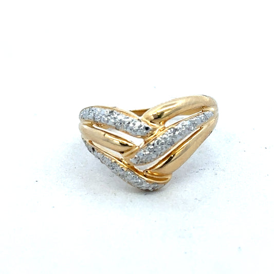 18ct yellow gold diamond ring by Reeves and Sons featuring sparkling diamonds and a sleek, elegant design.