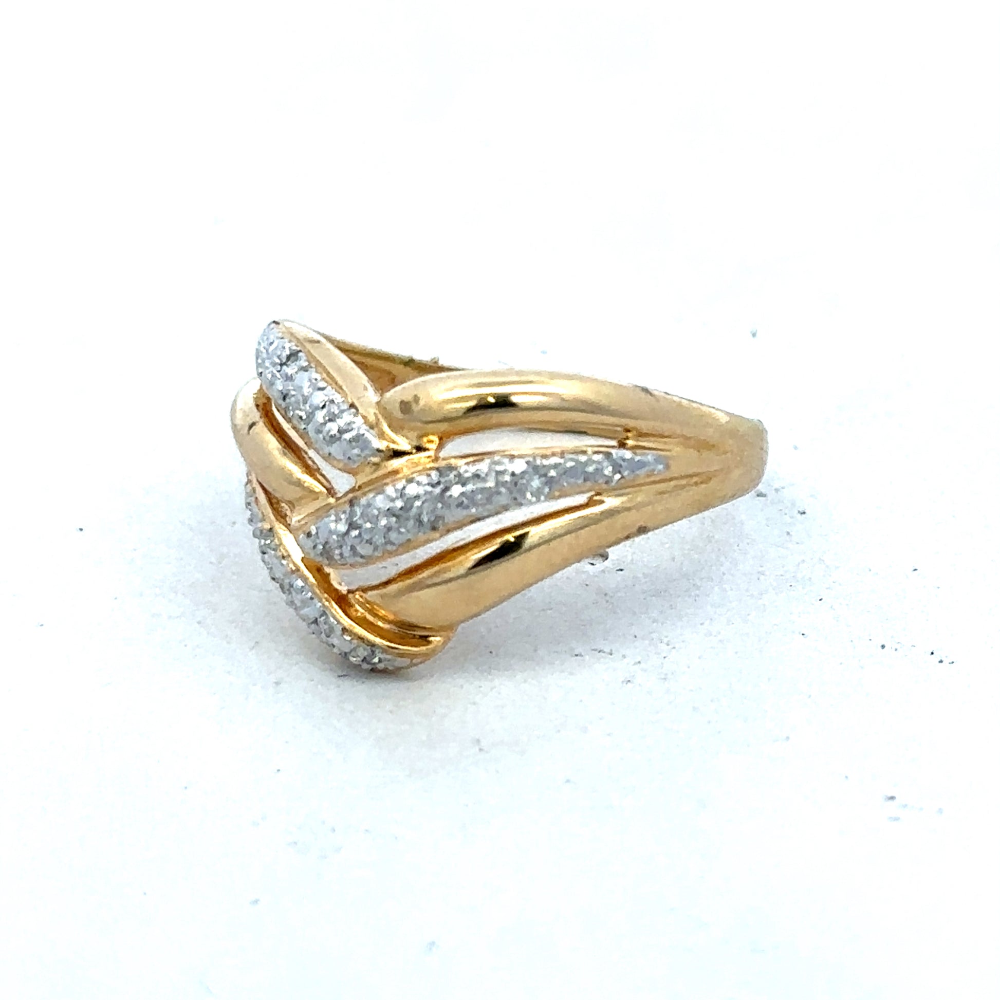 18ct yellow gold diamond ring by Reeves and Sons with sparkling diamonds and elegant design.