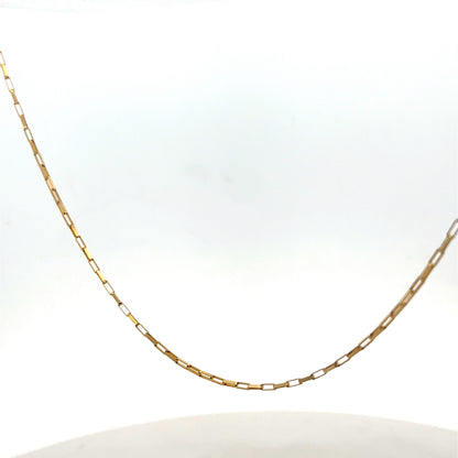 9ct yellow gold chain weighing 1.8g, featuring a delicate design, from Reeves and Sons, shown in the product image.