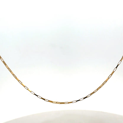 Reeves and Sons 9ct yellow gold chain, 1.8g, showcasing a delicate and polished jewelry chain with intricate links.