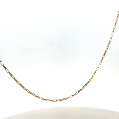 9ct yellow gold chain from Reeves and Sons, weighing 1.8g, with a close-up view showing its fine link design.