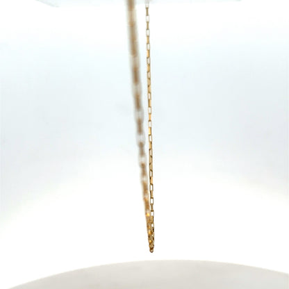 9ct yellow gold chain from Reeves and Sons, weighing 1.8g, featuring a delicate link design.