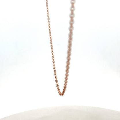 Reeves and Sons 9ct gold chain weighing 4.4g, featuring a detailed link design on a plain background.