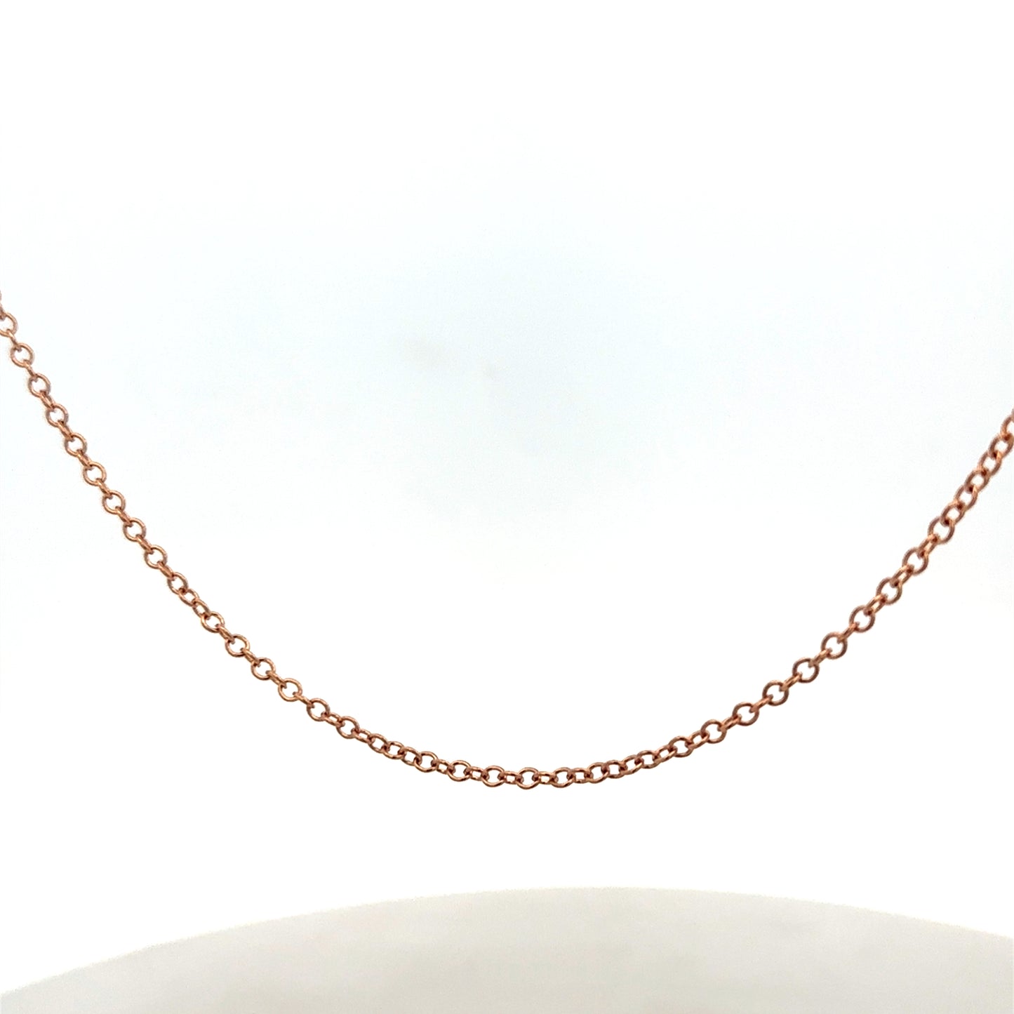 9ct gold chain weighing 4.4g with a detailed link design, crafted by Reeves and Sons.