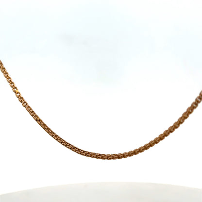 Reeves and Sons 9ct yellow gold chain weighing 6.5g, showcasing a detailed link design and polished finish.