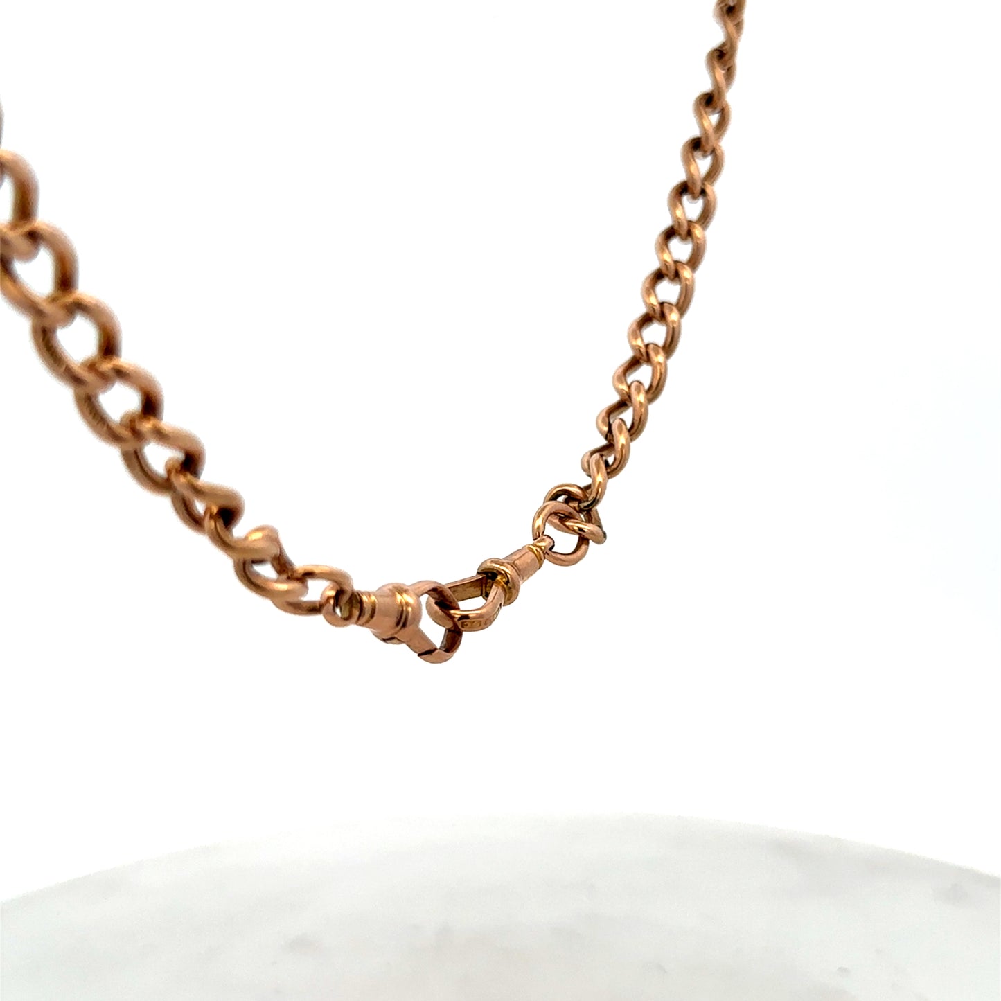 Reeves and Sons 9ct yellow gold bracelet weighing 31.3g, featuring a smooth, polished design on a white background.