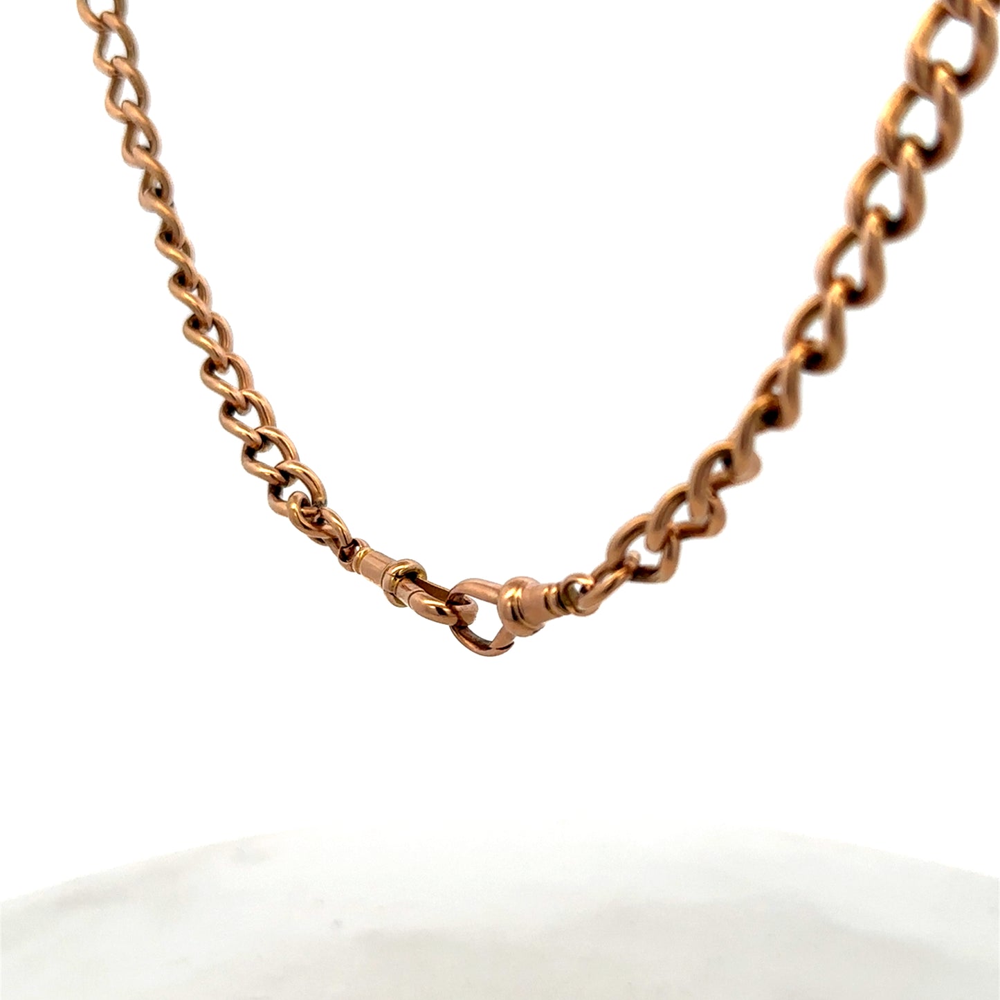 Reeves and Sons 9ct yellow gold bracelet with intricate link design, weighing 31.3g, displayed on a neutral background.