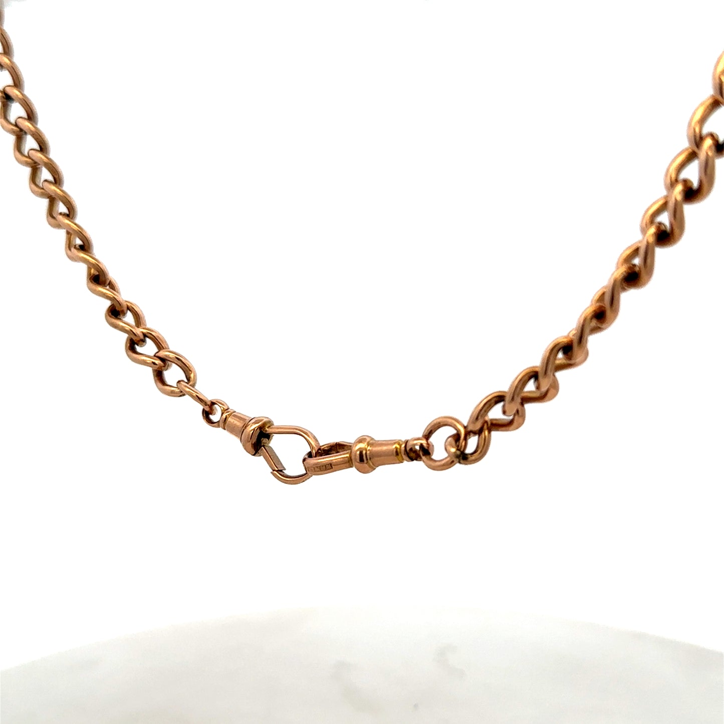 9ct yellow gold bracelet weighing 31.3g with a sleek design, crafted by Reeves and Sons, shown in close-up detail.