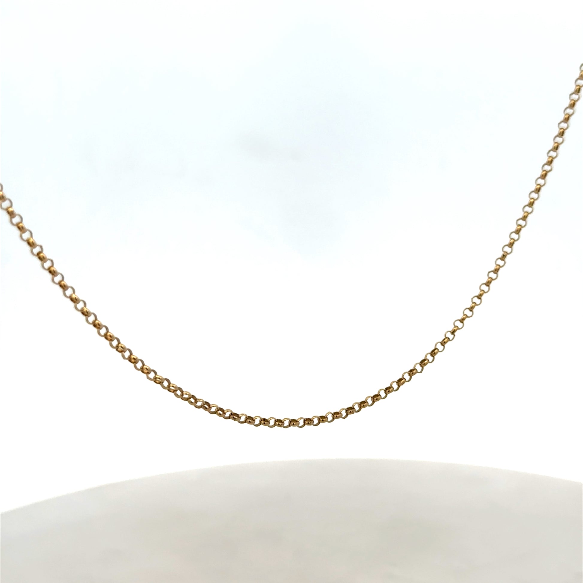 9ct yellow gold belcher chain from Reeves and Sons, 2.8g, showcasing its shiny, linked design on a plain background.