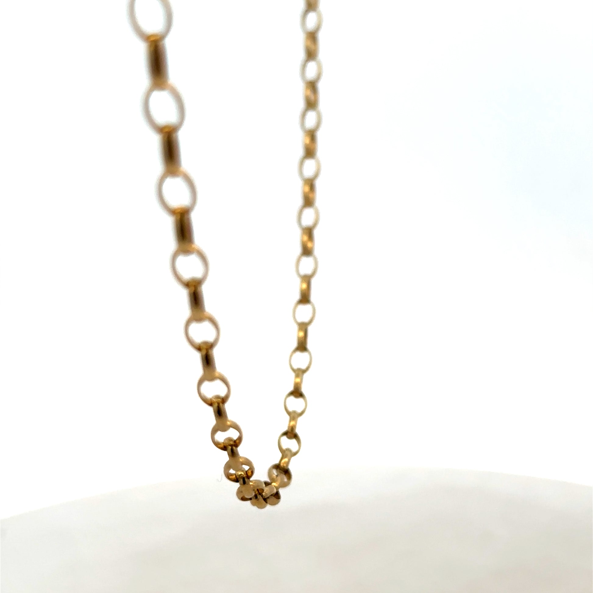 9ct yellow gold belcher chain with a polished finish, weighing 7.8g, from Reeves and Sons, displayed on a neutral background.