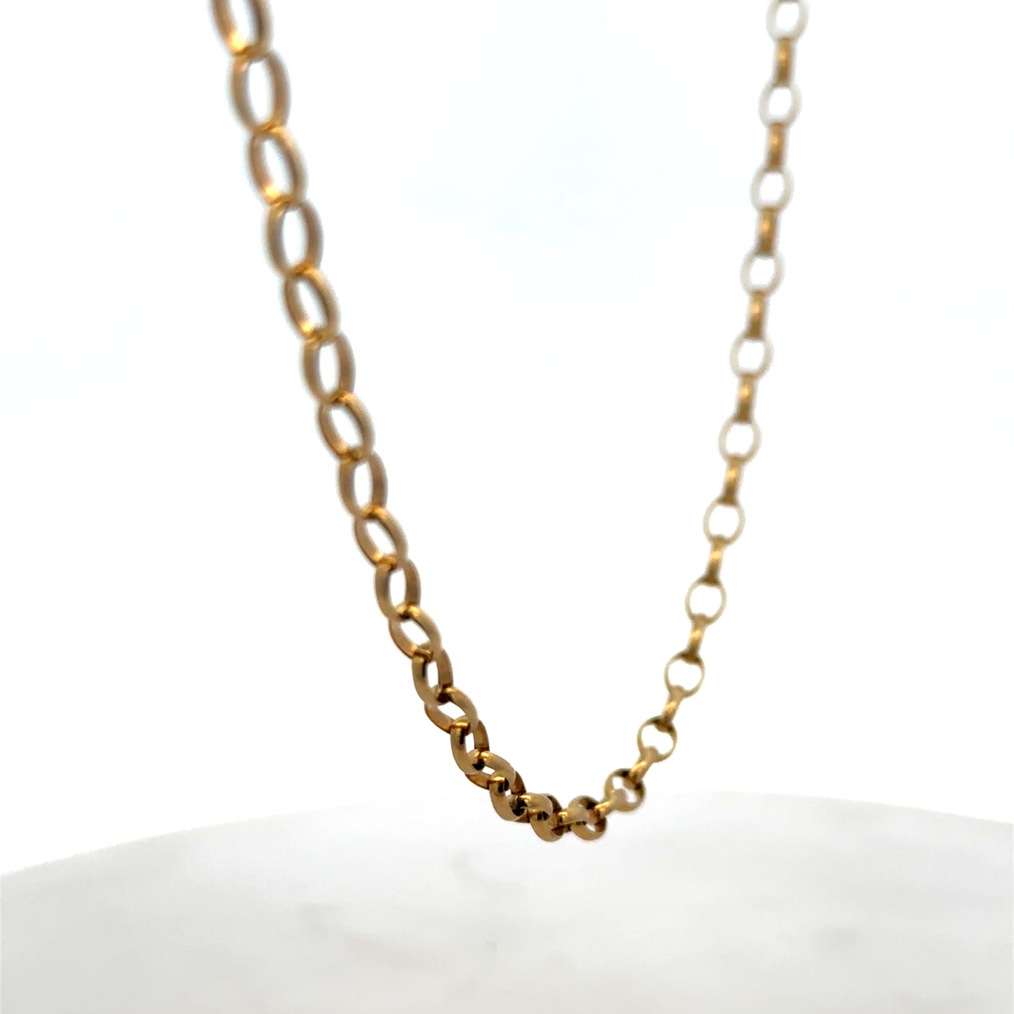 9ct yellow gold belcher chain with a smooth, shiny finish, weighing 7.8g, from Reeves and Sons.