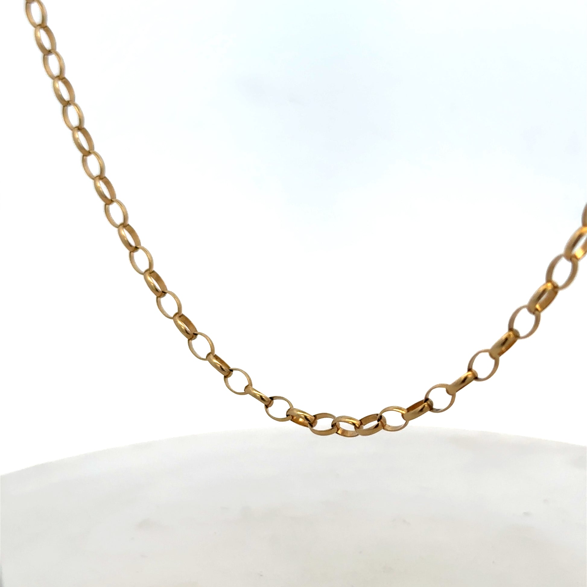 9ct yellow gold belcher chain from Reeves and Sons, showing the detailed link design and polished finish.