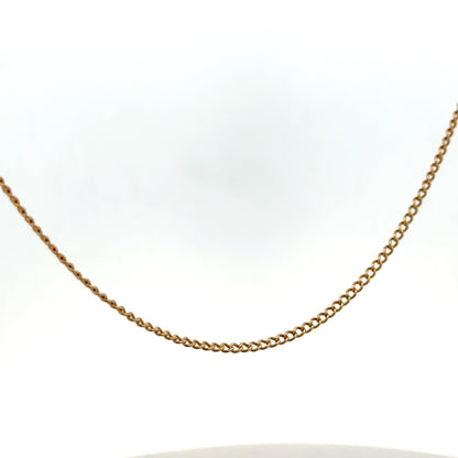 Reeves and Sons 9ct yellow gold chain weighing 4.6g, showcasing a detailed close-up of the jewelry link design.