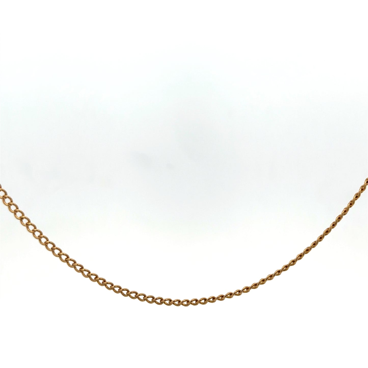 9ct yellow gold chain weighing 4.6g from Reeves and Sons, close-up view showing intricate link design and polished finish.