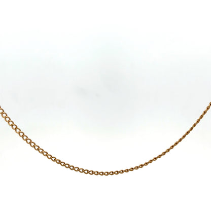 9ct yellow gold chain weighing 4.6g from Reeves and Sons, close-up view showing intricate link design and polished finish.