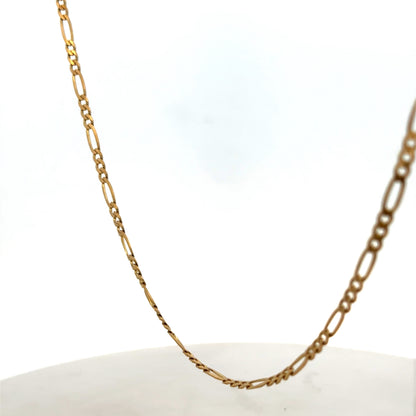 Reeves and Sons 9ct yellow gold figaro chain, 7.1g, showing the textured links and polished finish on a white background.