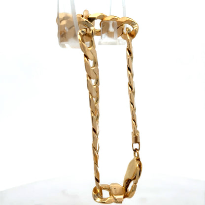 9ct yellow gold curb bracelet weighing 29.9g with Reeves and Sons branding, featuring polished interlinked chain links.