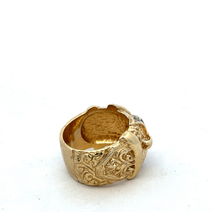 9ct yellow gold buckle ring in size Y with detailed buckle design, crafted by Reeves and Sons.