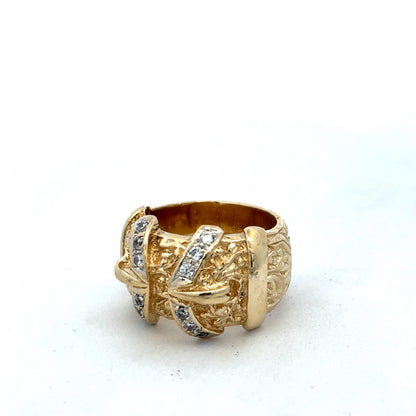 9ct yellow gold buckle ring in size Y by Reeves and Sons, featuring a polished finish and decorative buckle design.