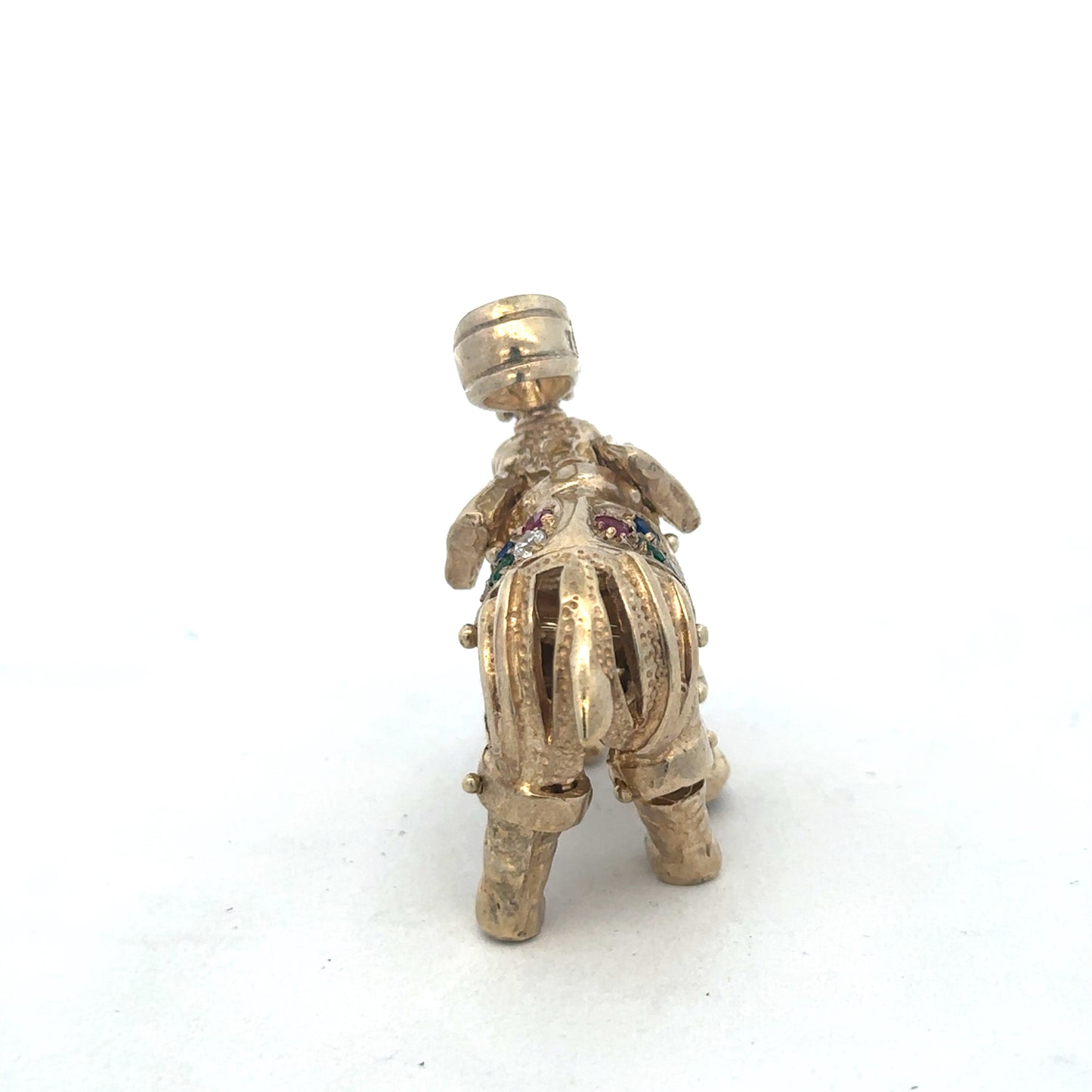 9ct yellow gold elephant pendant by Reeves and Sons, detailed pendant with intricate elephant design on a chain.
