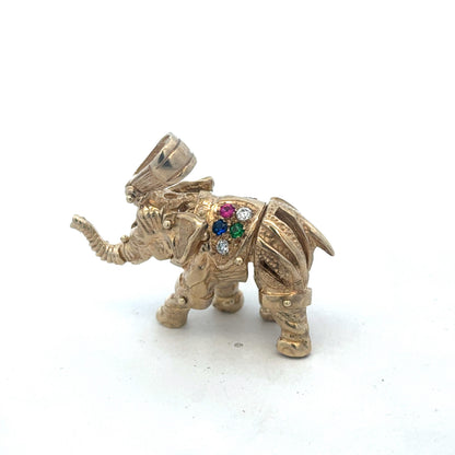 9ct yellow gold elephant pendant by Reeves and Sons, detailed charm weighing 25.3g, showcasing intricate design and craftsmanship.