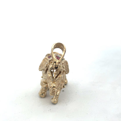 9ct yellow gold elephant pendant weighing 25.3g, detailed pendant jewelry from Reeves and Sons.