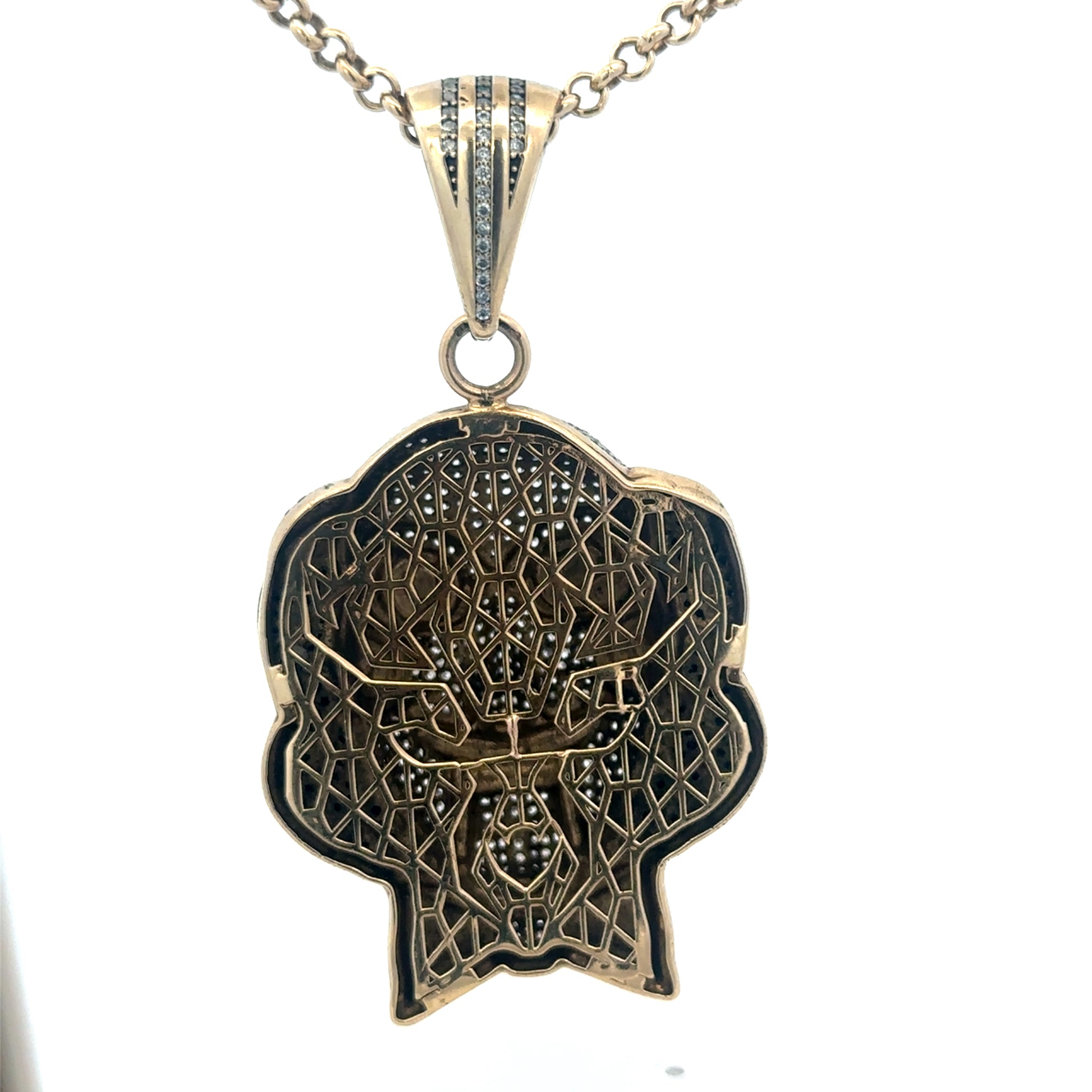 9ct yellow gold jigsaw pendant by Reeves and Sons, showcasing a detailed, polished pendant with intricate jigsaw design.