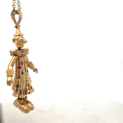 9ct yellow gold clown pendant from Reeves and Sons, detailed jewelry piece weighing 42.5g, showcasing a playful clown design.
