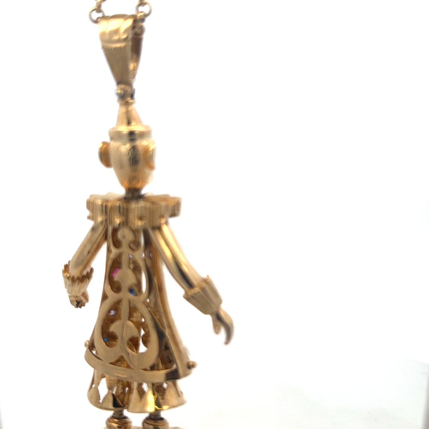 9ct yellow gold clown pendant with intricate details, weighing 42.5g, from Reeves and Sons.