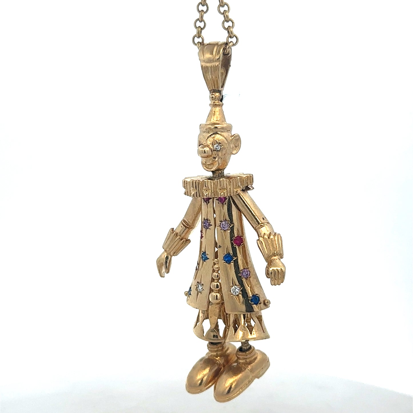 9ct yellow gold clown pendant with detailed design, weight 42.5g, crafted by Reeves and Sons.
