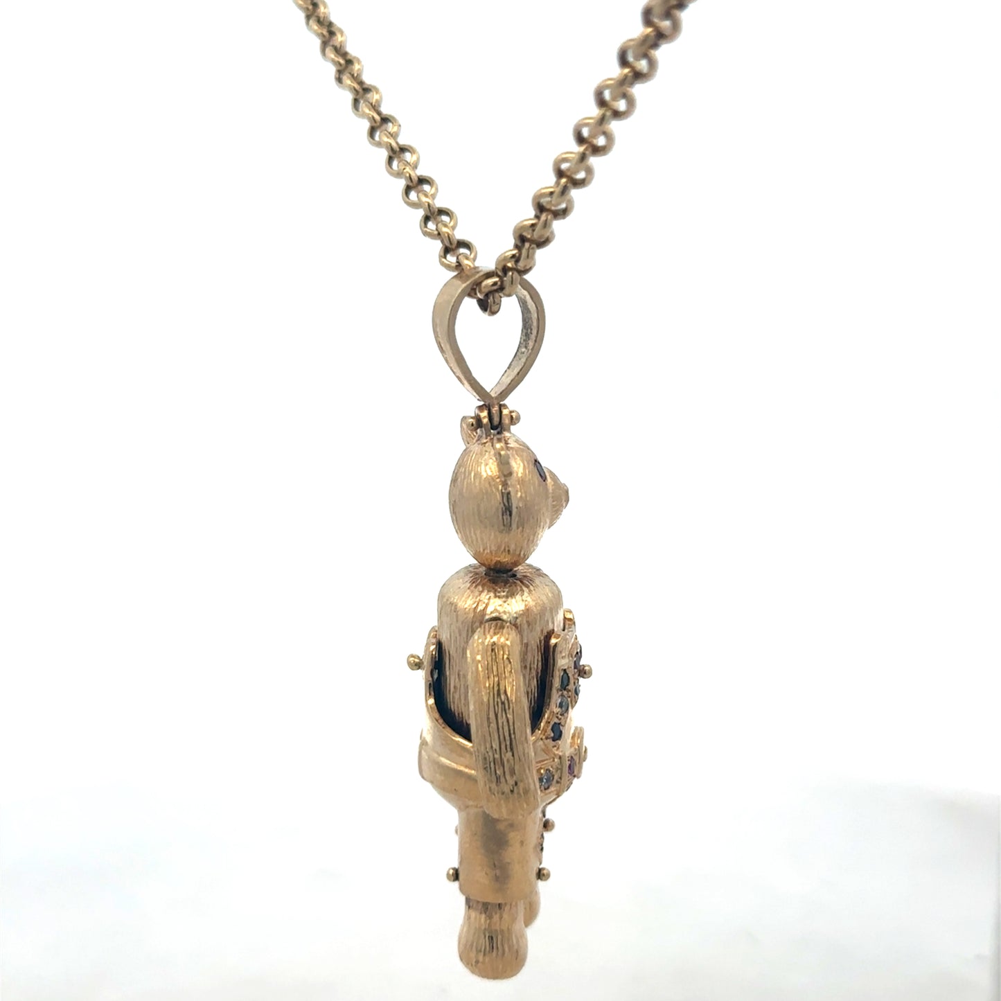 9ct yellow gold teddy bear pendant with detailed design, weighing 20.4g, crafted by Reeves and Sons.