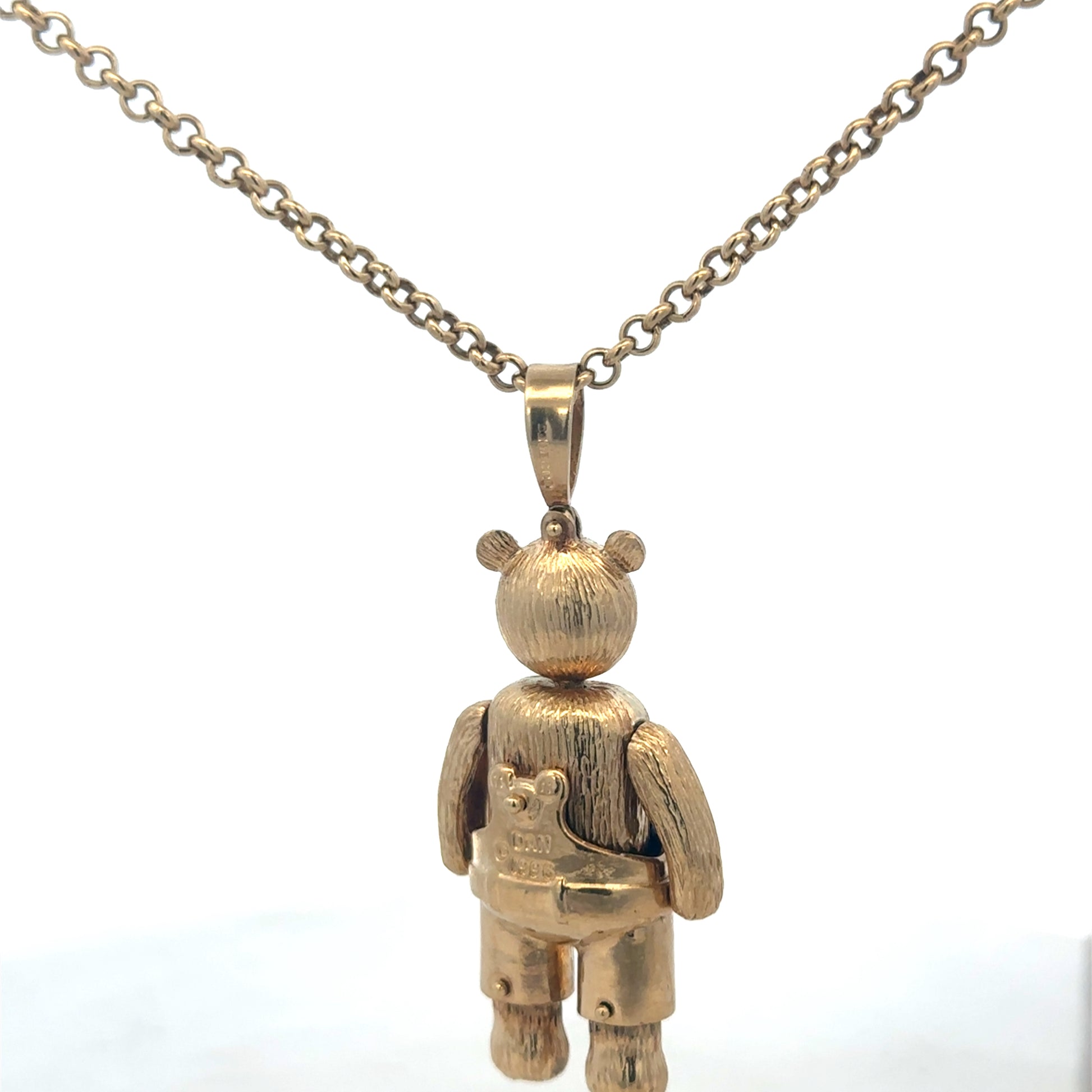 9ct yellow gold teddy bear pendant with detailed design, weighs 20.4g, crafted by Reeves and Sons.