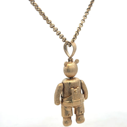 9ct yellow gold teddy bear pendant with detailed design, weighing 20.4g, from Reeves and Sons, showcasing craftsmanship and fine jewelry.