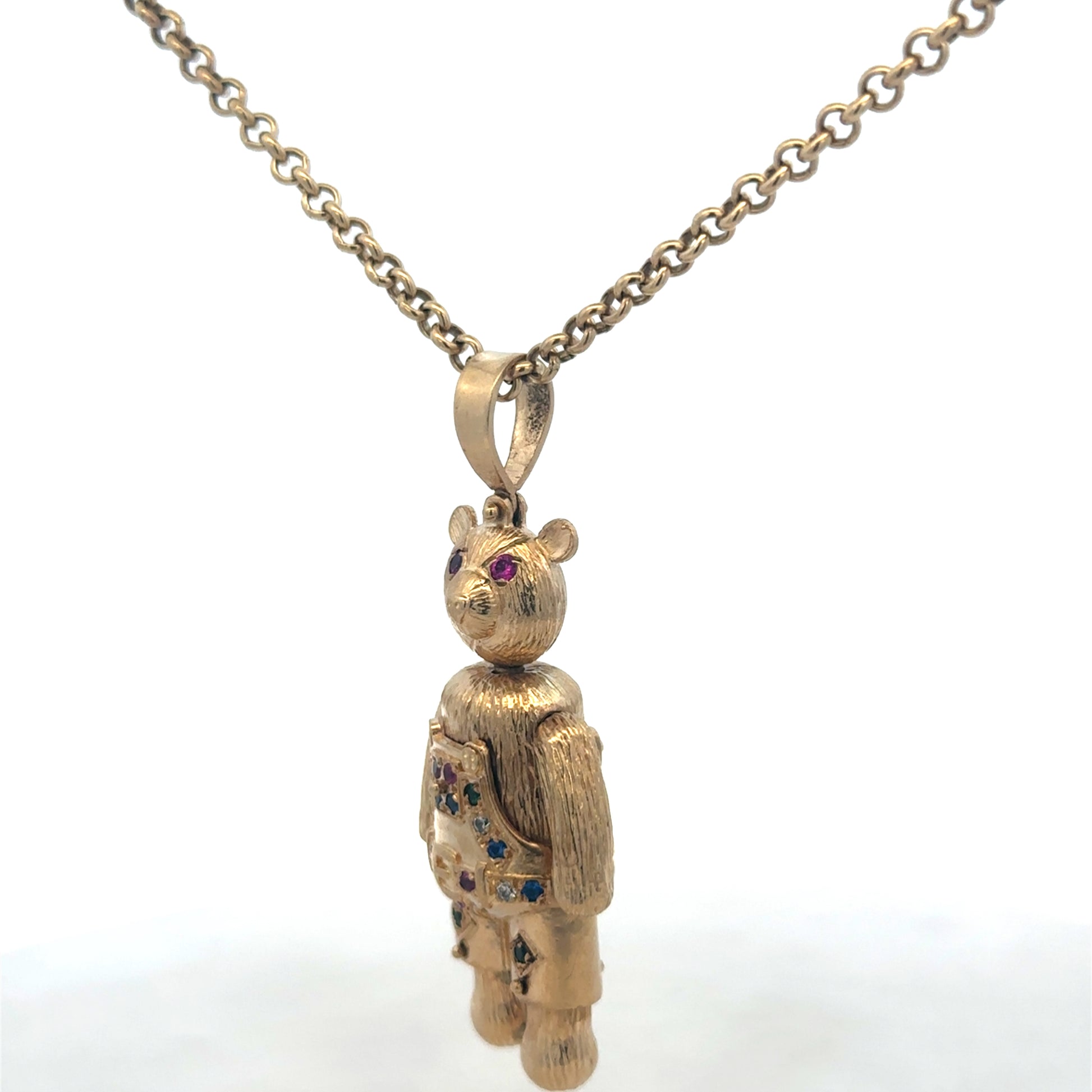 9ct yellow gold teddy bear pendant with detailed design, weighs 20.4g, crafted by Reeves and Sons.