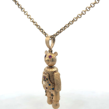 9ct yellow gold teddy bear pendant with detailed design, weighs 20.4g, crafted by Reeves and Sons.