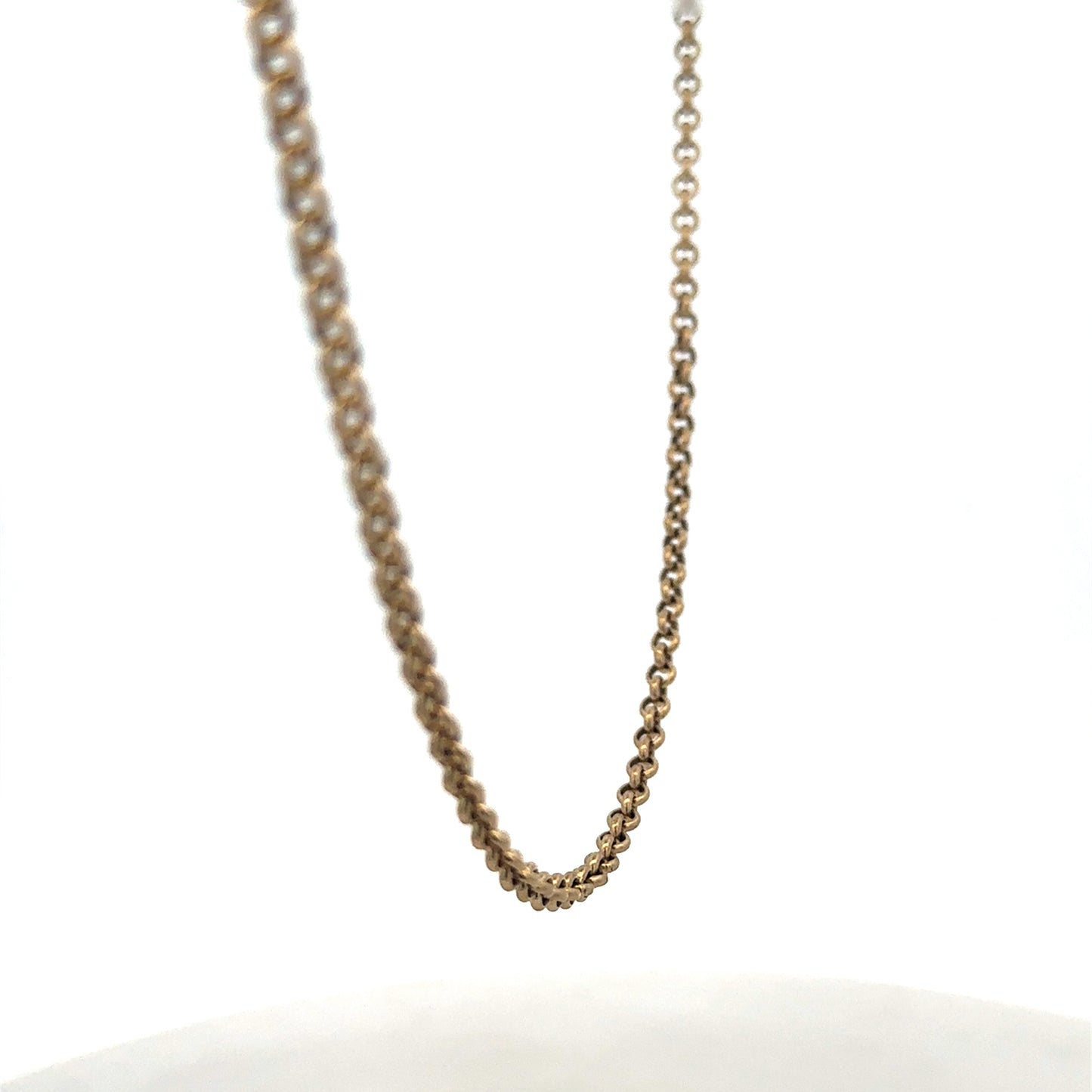 9ct yellow gold belcher chain weighing 13.4g, from Reeves and Sons, displayed laying flat showing its detailed link design.