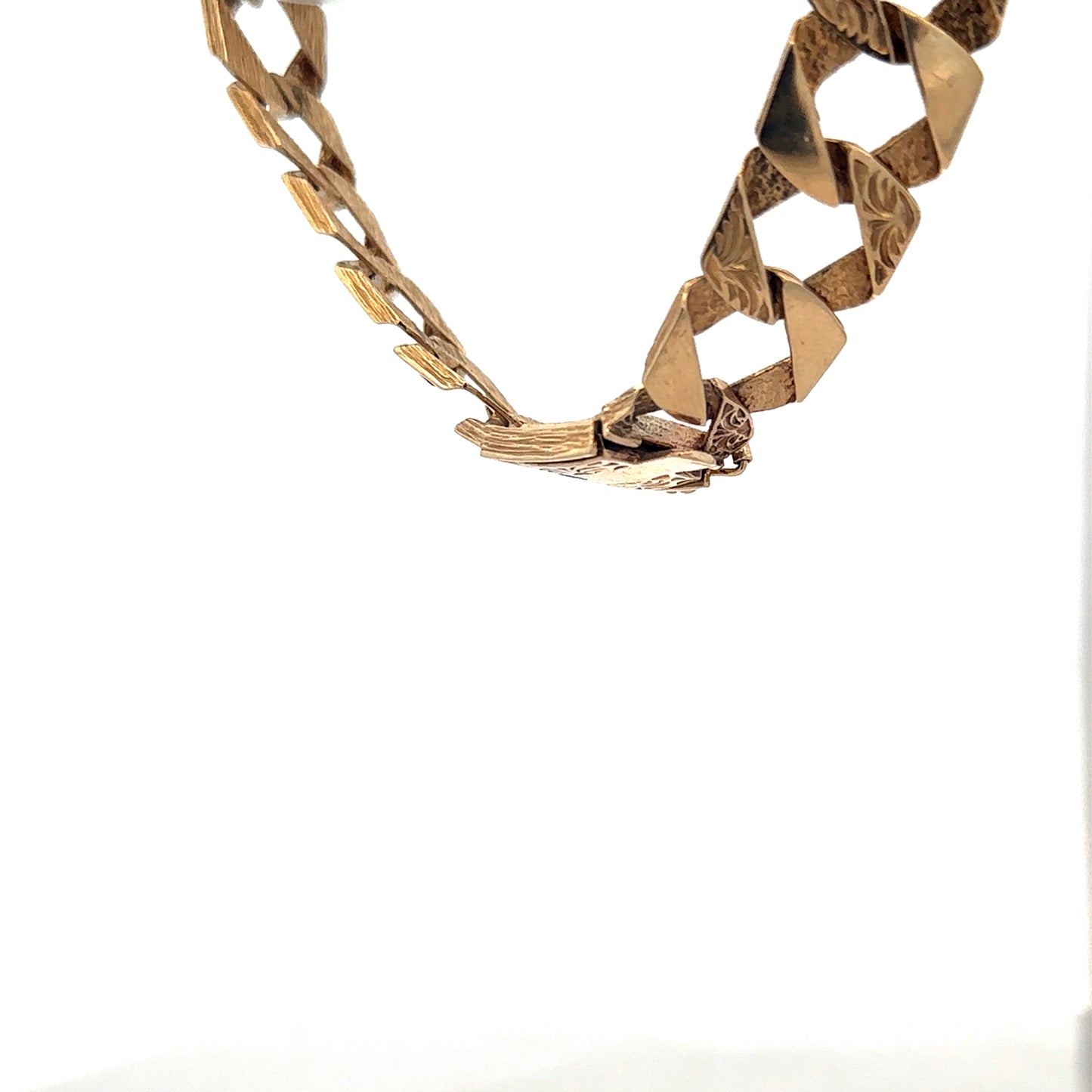 9ct yellow gold bracelet weighing 29.5g with intricate link design, crafted by Reeves and Sons.
