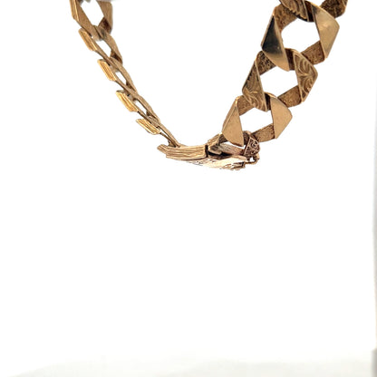9ct yellow gold bracelet weighing 29.5g with intricate link design, crafted by Reeves and Sons.