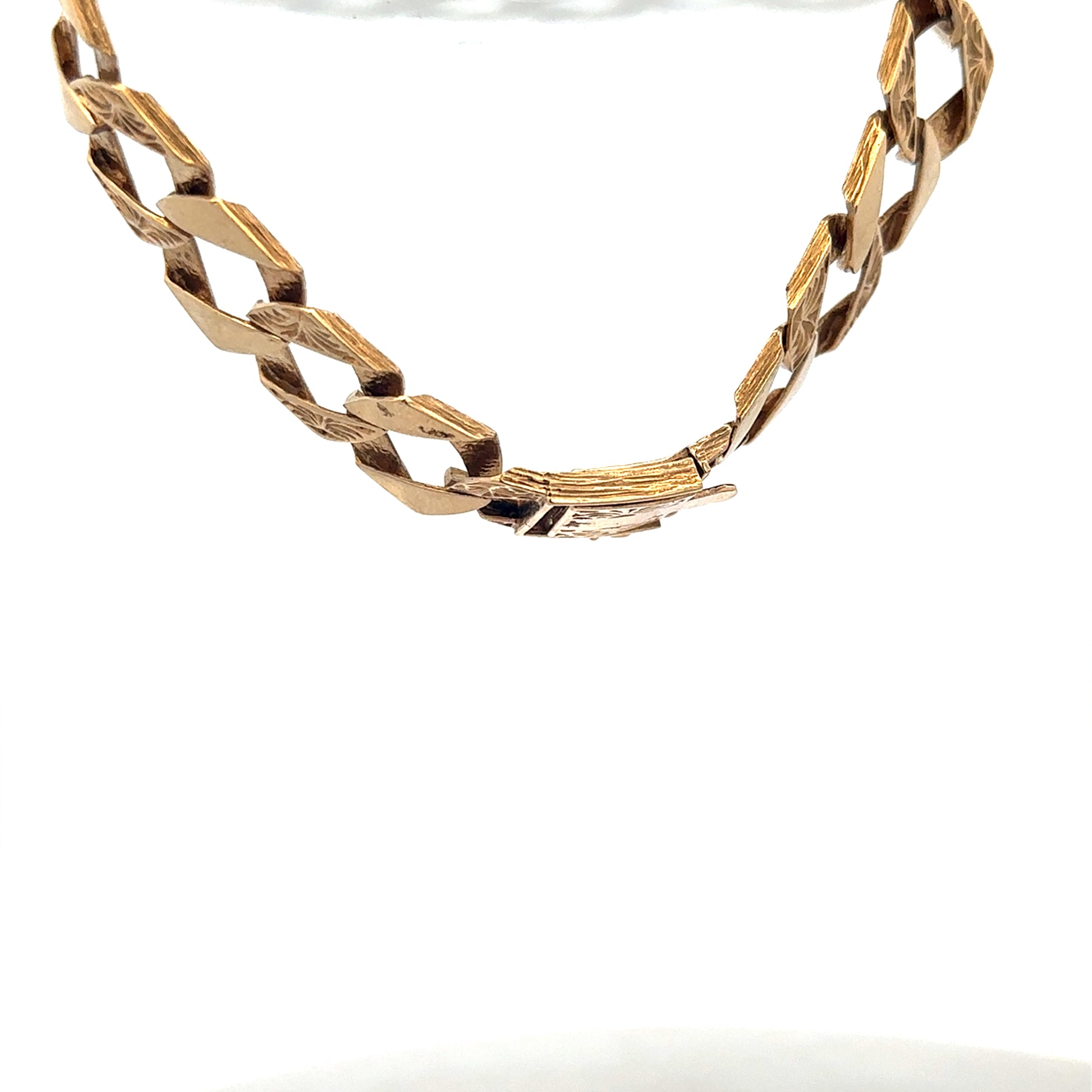 Reeves and Sons 9ct yellow gold bracelet weighing 29.5g with a polished chain design and secure clasp.