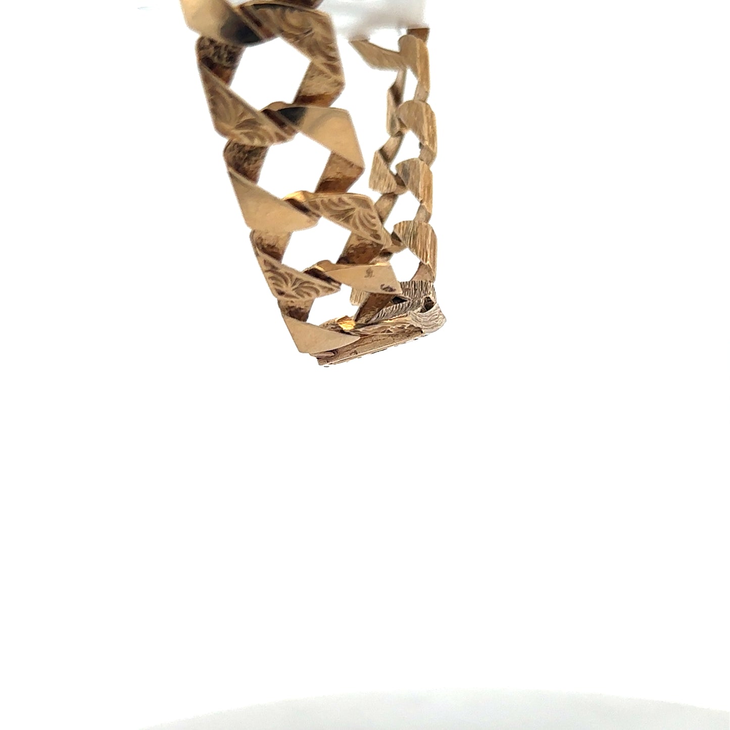 9ct yellow gold bracelet with intricate link design, weighing 29.5g, by Reeves and Sons, displayed on a neutral background.