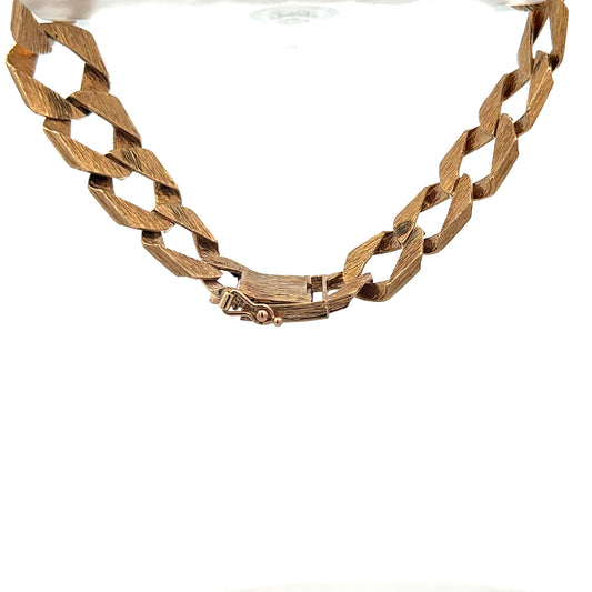 Reeves and Sons 9ct yellow gold bracelet with 29.5g weight, showcasing a polished, elegant design.